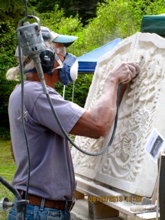 Mark Andrews working on a Limestone Relief