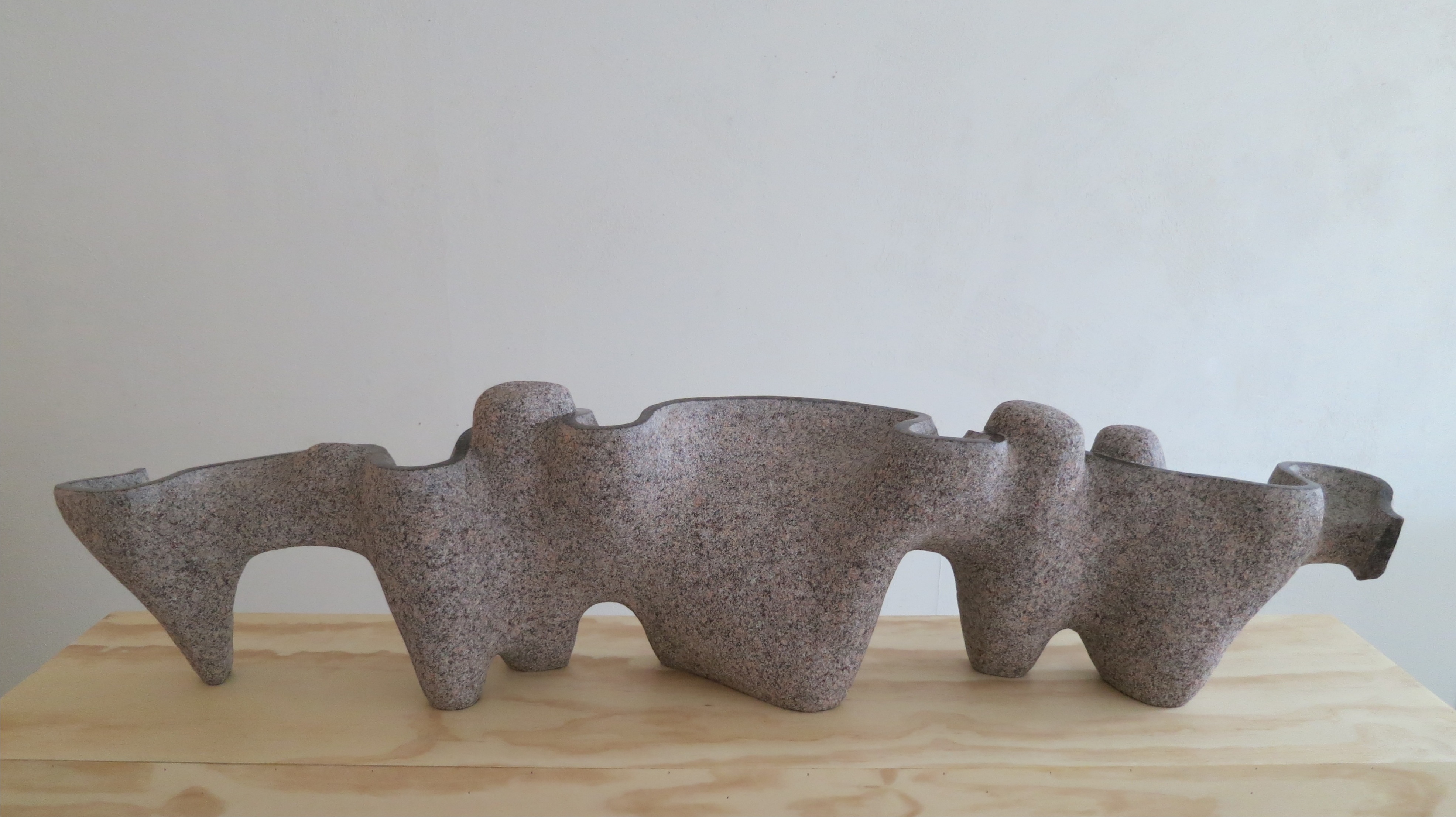 • Traveling Over Red Mountain. Red Granite, 15 ½” H x 7 ½” W x 66” L, Bob Leverich