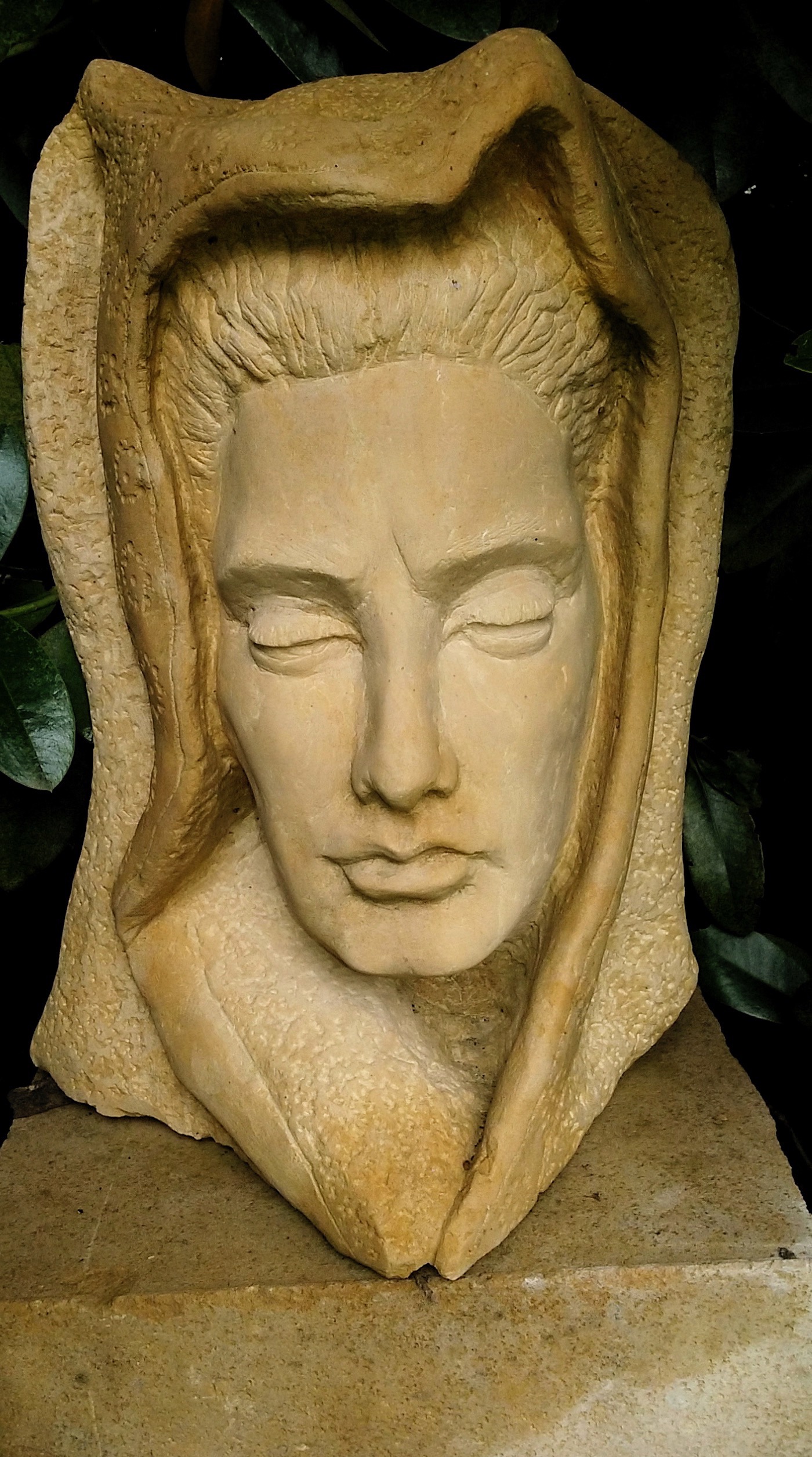 “Mother Spirit”, limestone, 2013, 9” X 16” X 8”     She also watches over the garden.