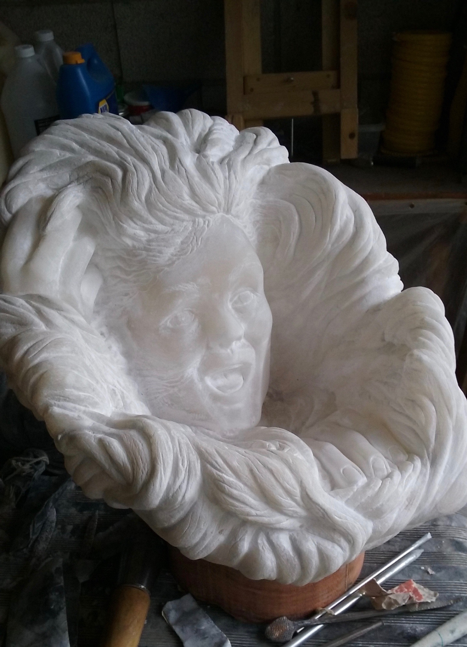 “Laughing Wind”, alabaster, 18” X 14” X 16”