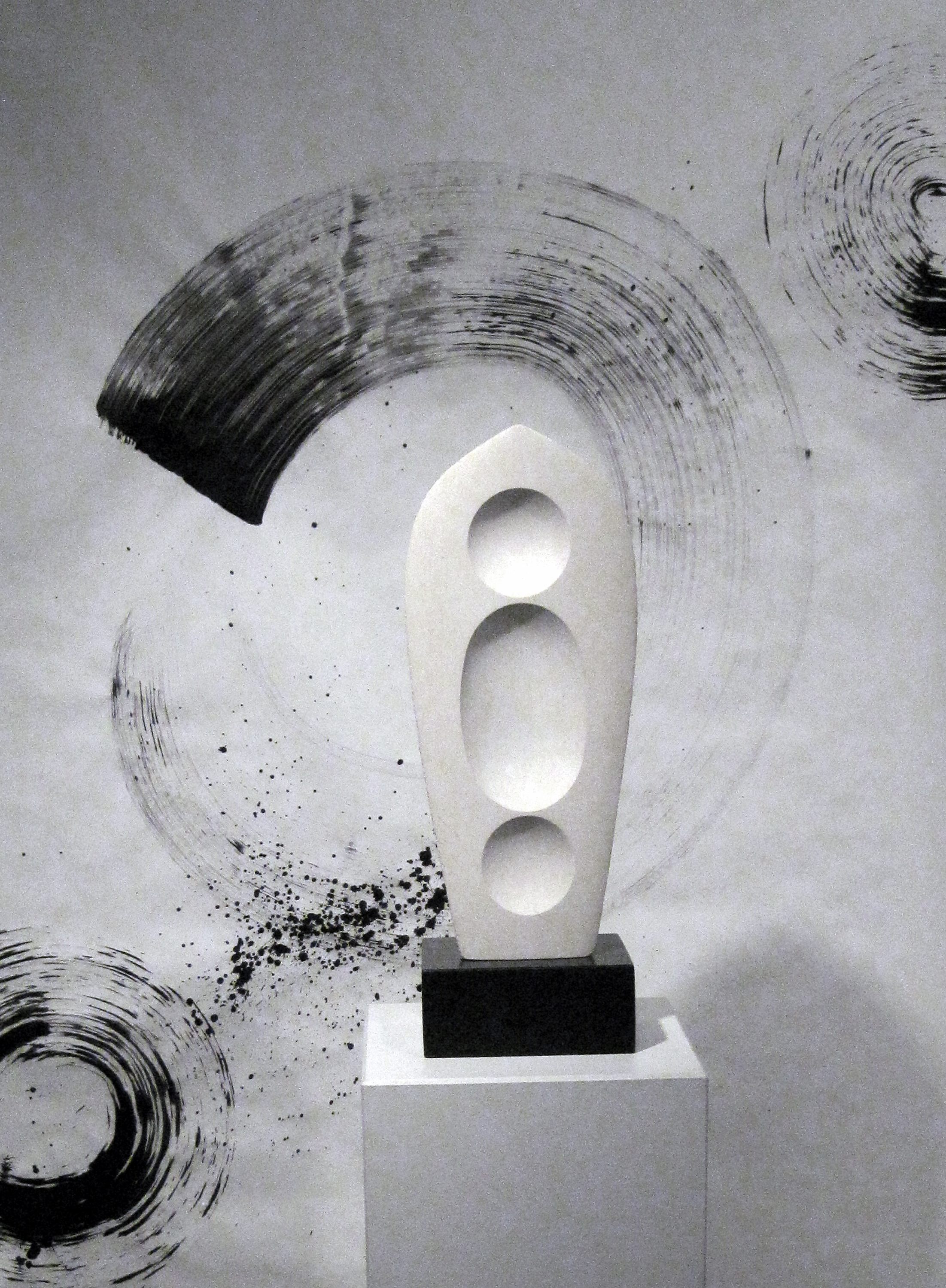 “Chrysalis”, Oolitic limestone, 19” X 8” X 4”, Background sumi-e painting by Jim Ballard.