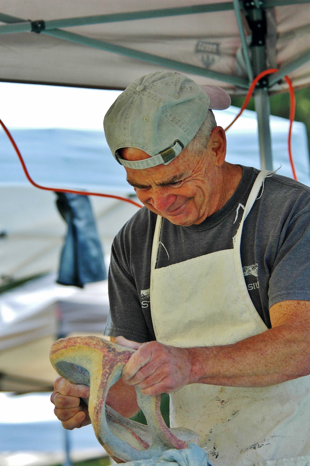 Bob Olander working on his sculpture during the symposium. 